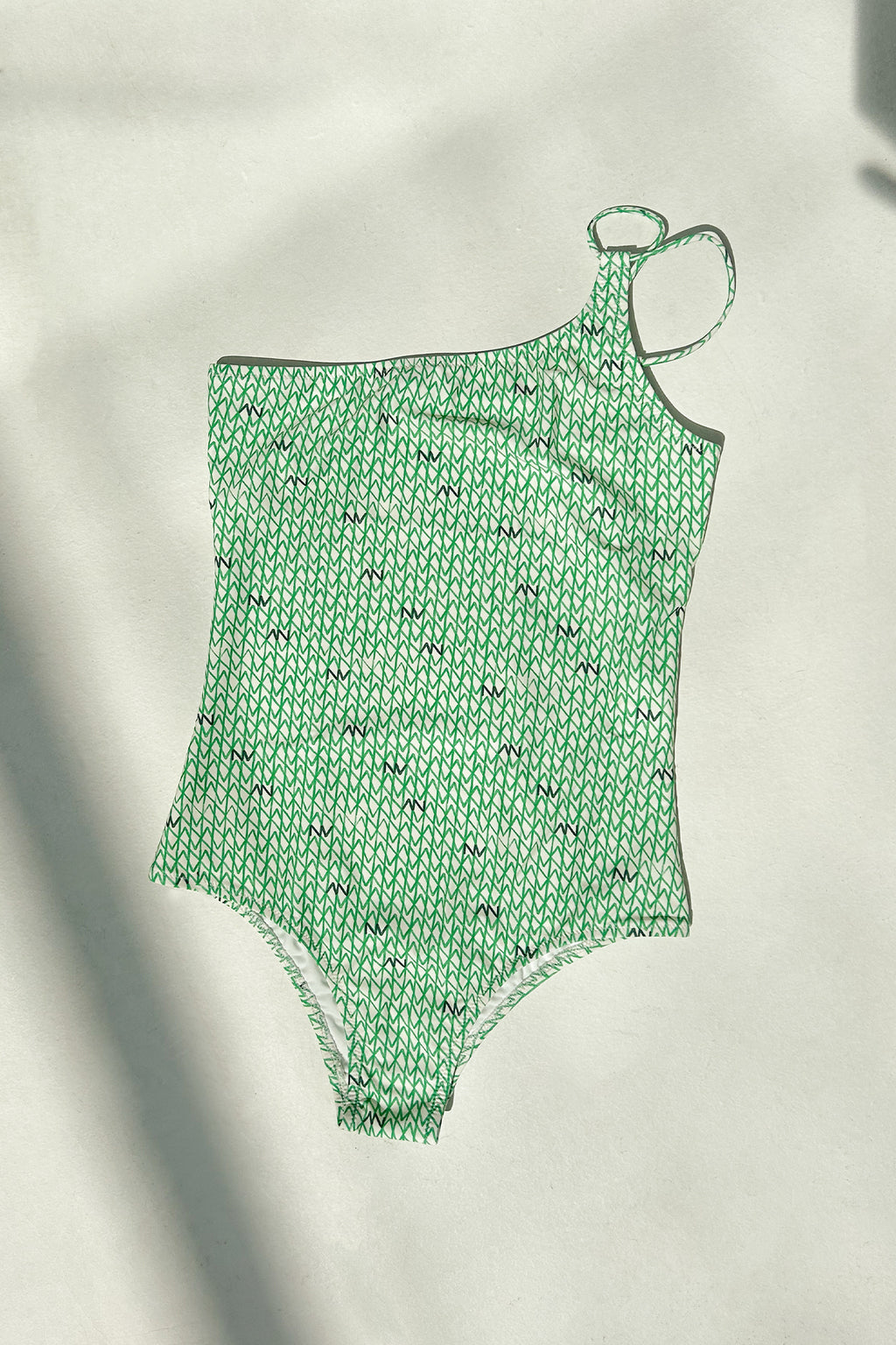 Green asymmetrical swimsuit