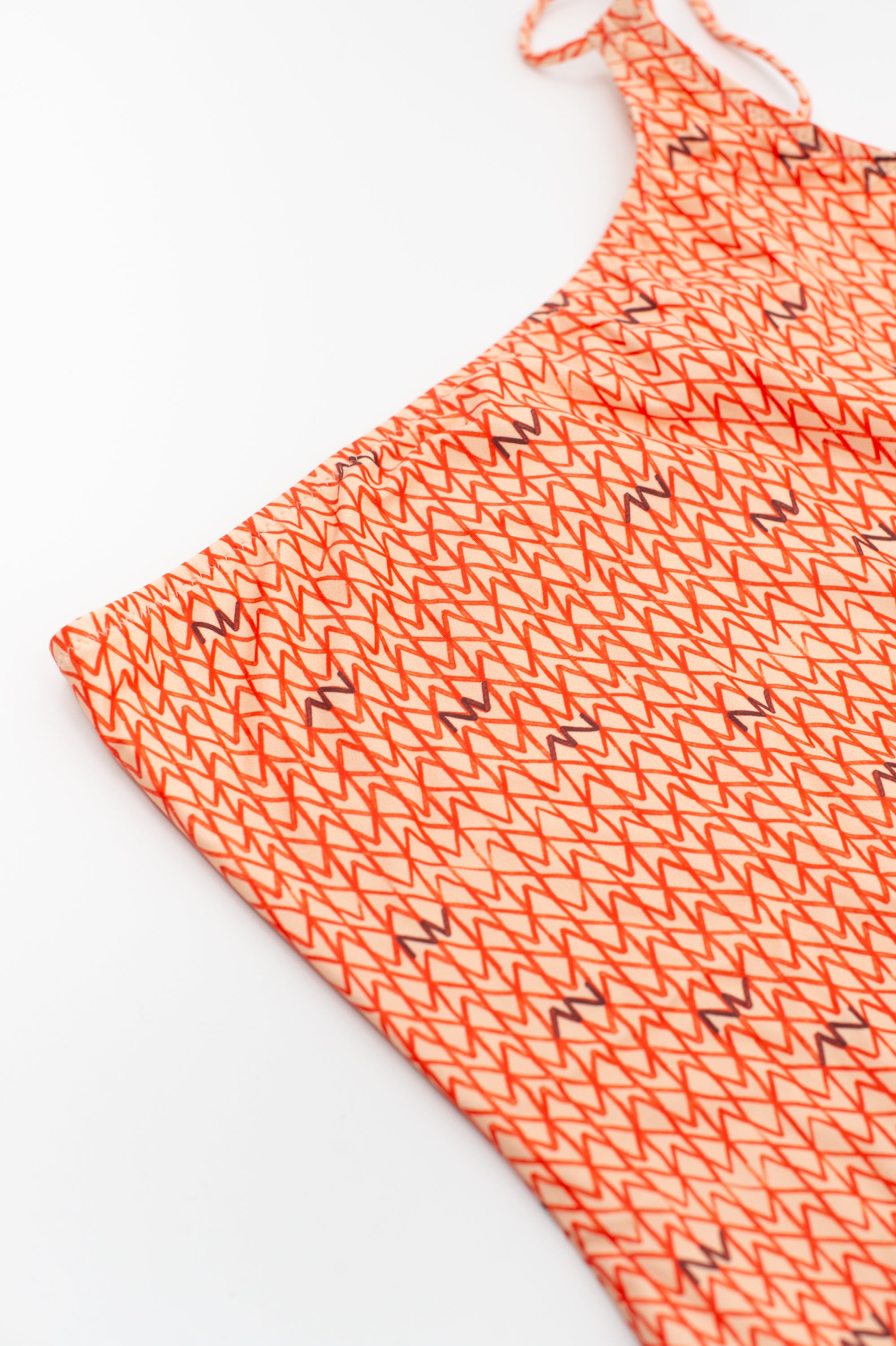 Oranger asymmetrischer Badeanzug